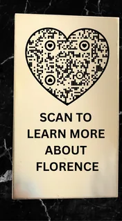 Memorial plaque with a heart-shaped QR code