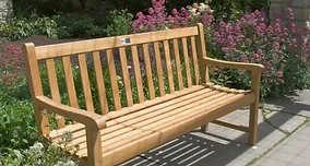 Memorial bench with plaque