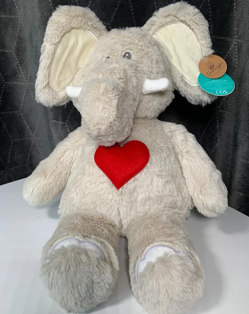 Eddie, a grey elephant soft toy with a red heart on his chest