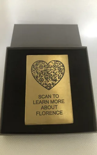 Heart-shaped memorial plaque presented in a black box