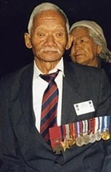 Lachhiman Gurung after retirement, wearing his medals